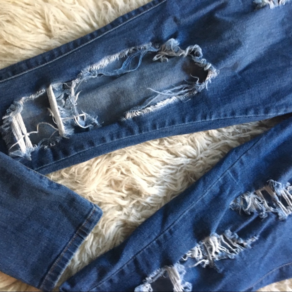 FashionNova high-waisted distressed denim jegging